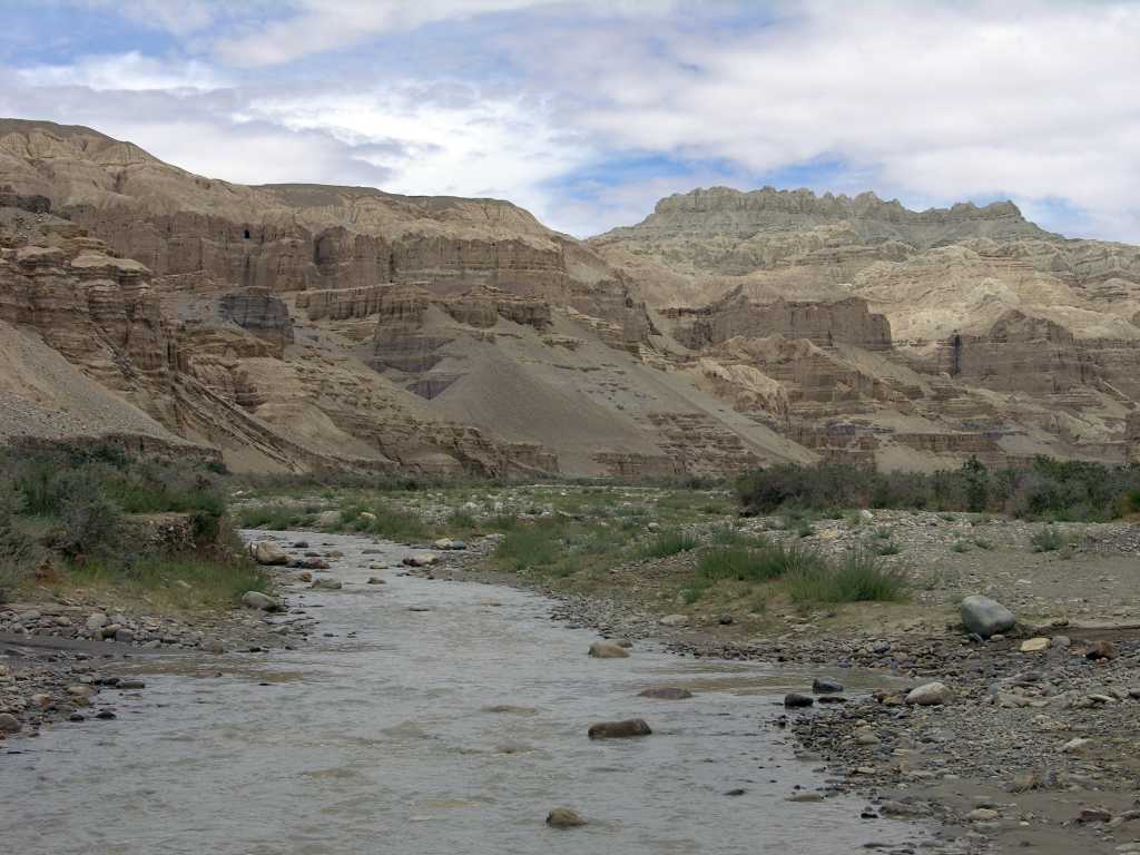 Tibet Guge 01 To 19 Sutlej Canyon Exit We enter narrow deep gullies; corridors in fantastic castles; from time to time, wide spaces on which stand vertically towers and peaks � contorted, ponderous � or there rise solitary monolithic columns with enormous capitals. - Giuseppi Tucci: Secrets of Tibet (September 18, 1933)